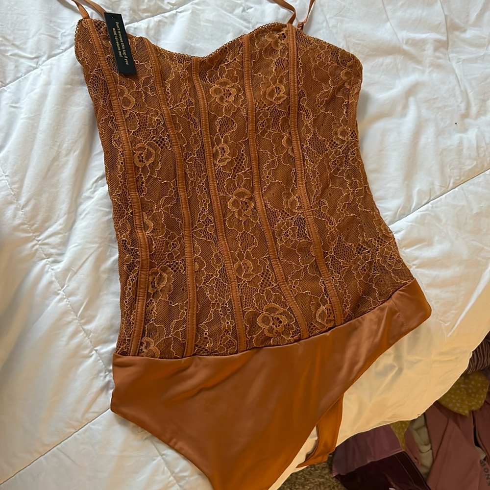 Never worn thong bodysuit!